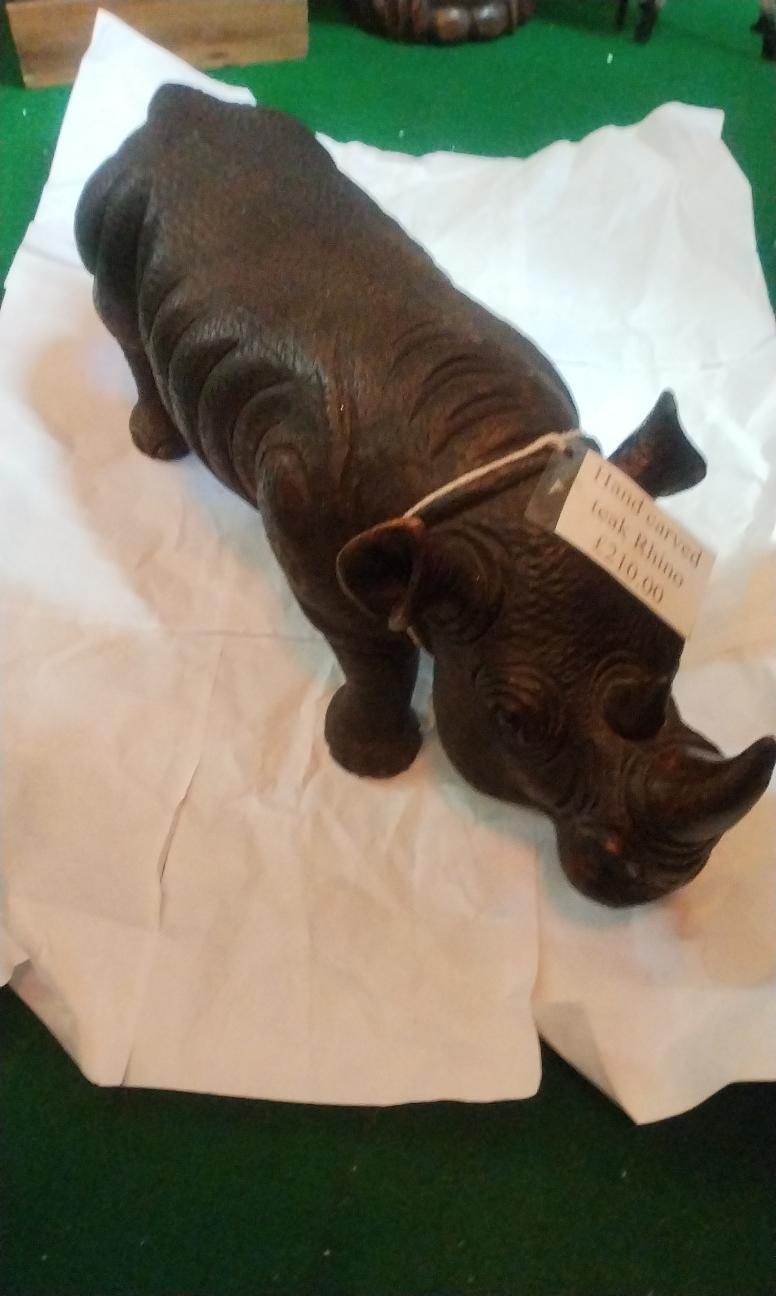 Hand caved teak rhino 