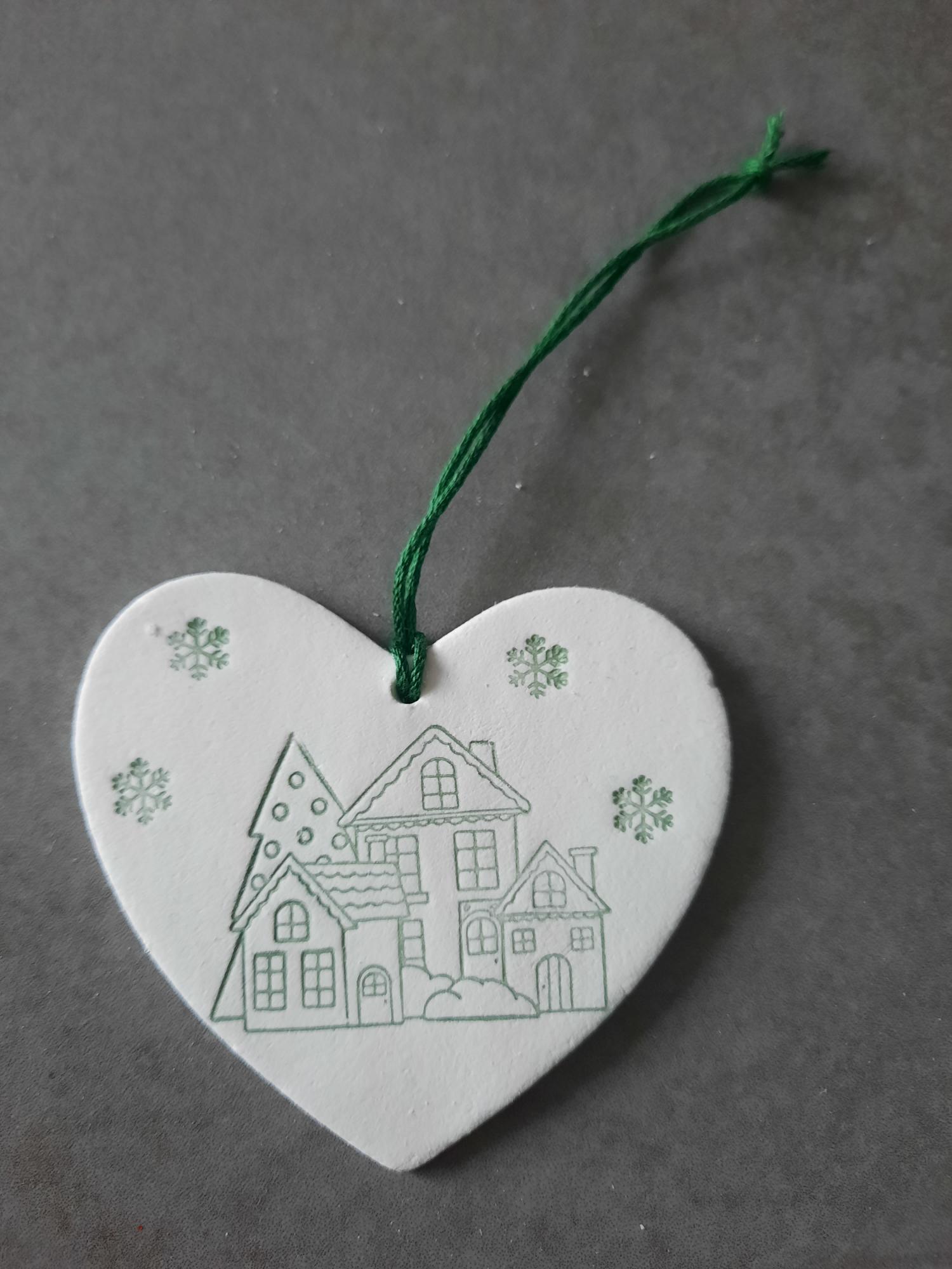 Maison sous la neige