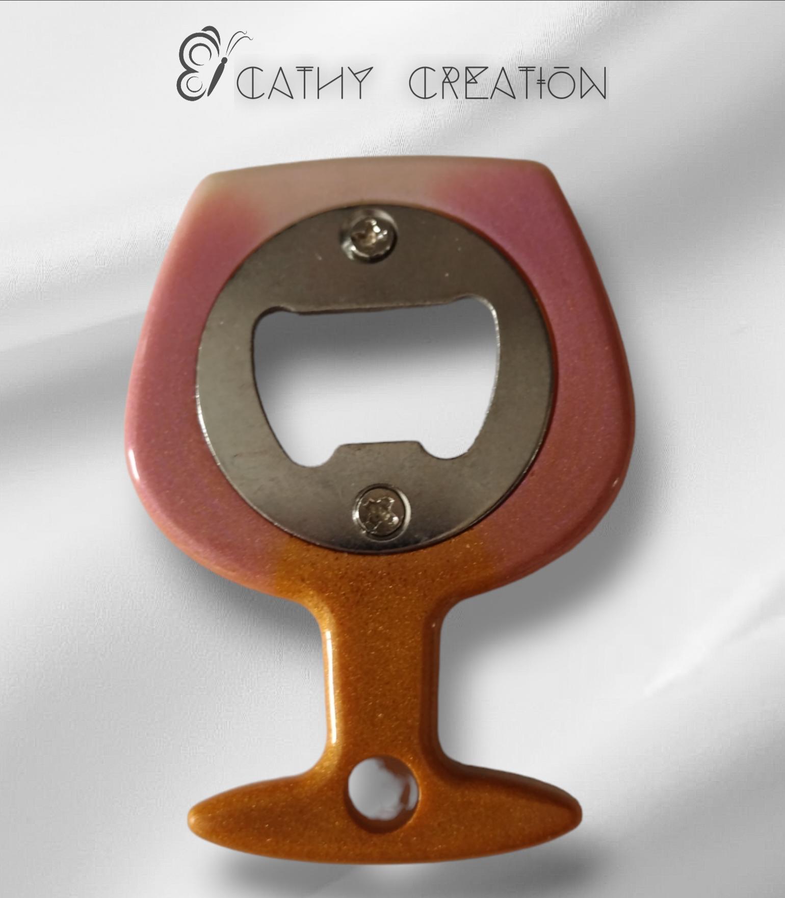 Décapsuleur rose/doré 