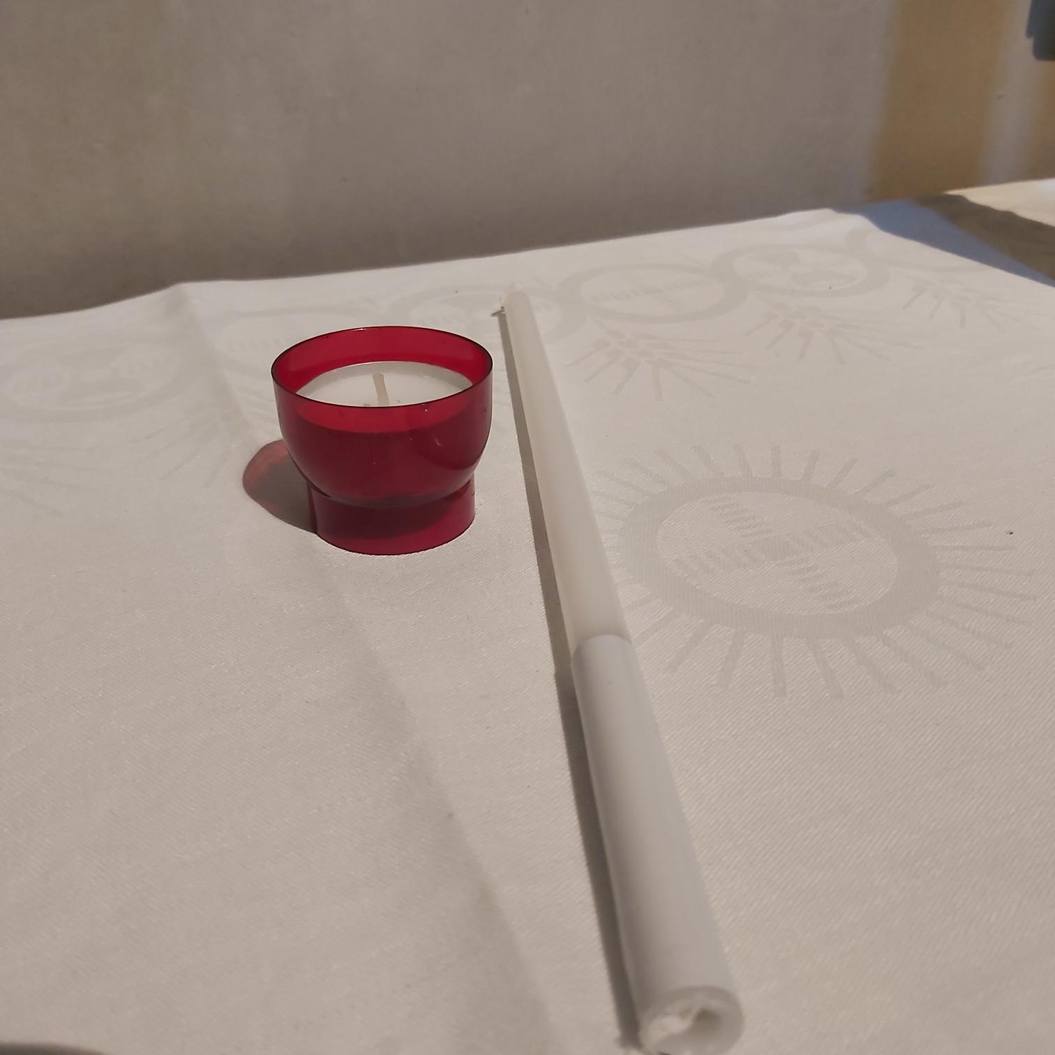 Ontsteken van een Devotiekaars