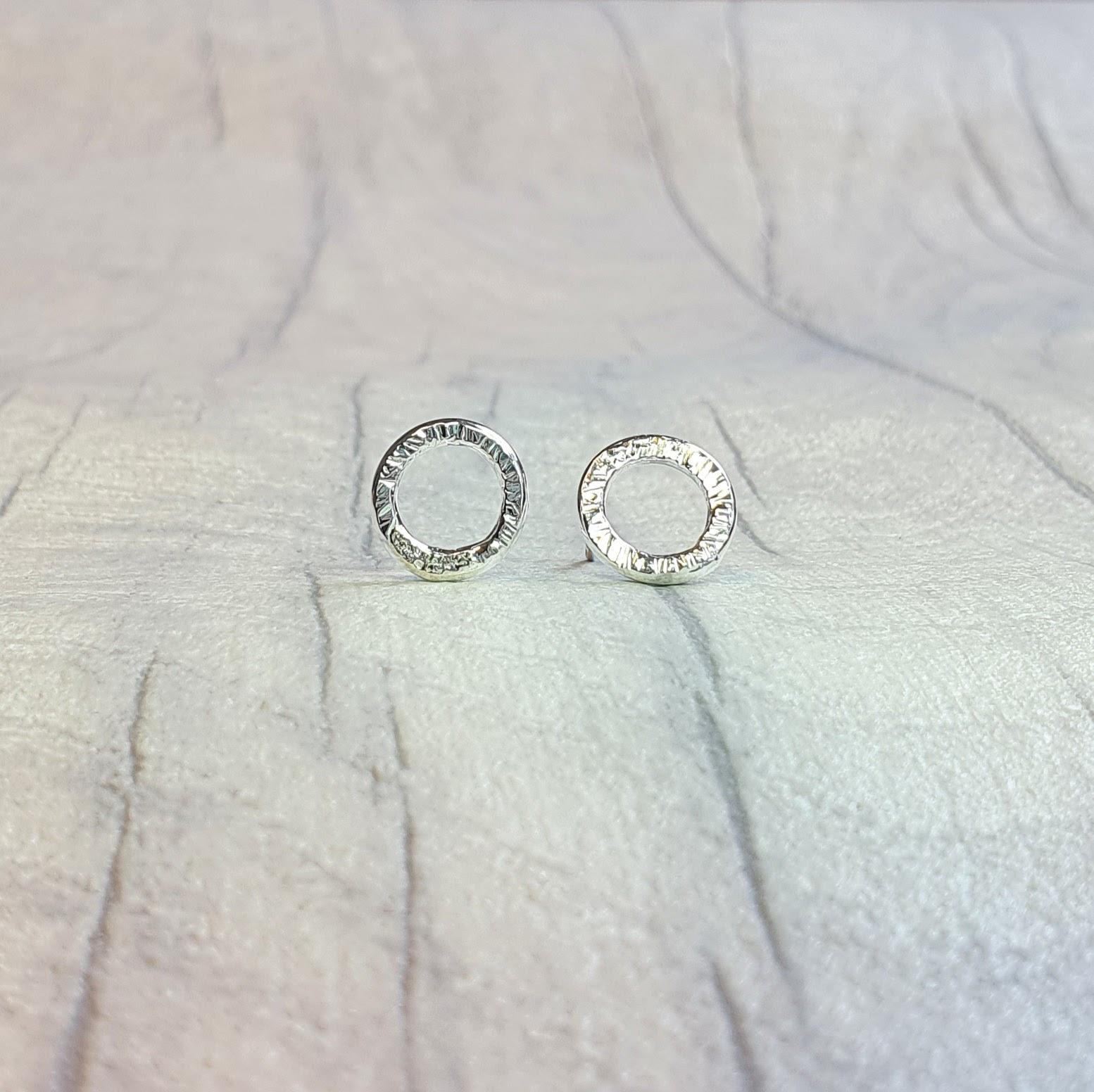 Sterling silver textured hoop studs