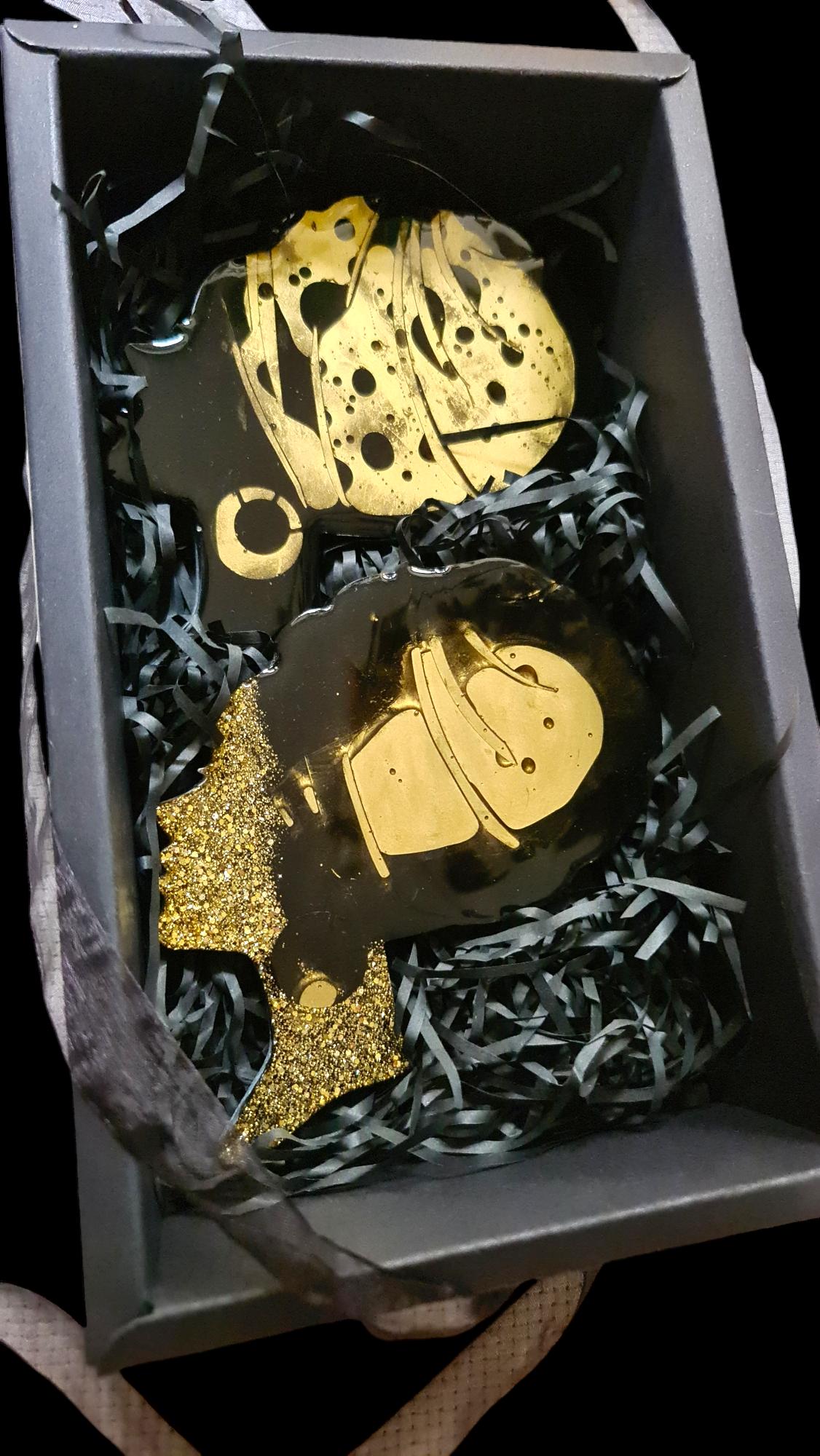 Set of 2 black and gold coasters